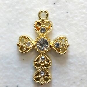 Goldtone and rhinestone cross pendant New